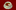 An image of a tea cup with a dainsy in it against a red background.